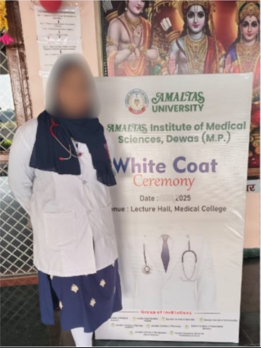 Student in a white coat at a medical college white coat ceremony, face blurred for privacy